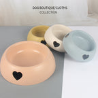 Colorful pet food and water bowl